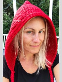 a woman wearing a red knitted hood with text overlay that reads, free crochet pattern