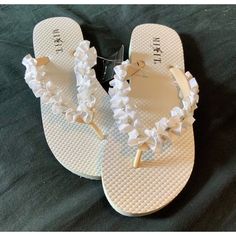 Nwt. Never Worn, True To Size. Rhinestones Set In Ruffles. Dress Up Or Dress Down! Marker Line On Left Sandal, But Covered When Worn. It Shoes, Ruffles Dress, Beige Sandals, Rubber Flip Flops, Floral Sandals, Pink Sandals, White Sandals, Rhinestone Designs, White Flats