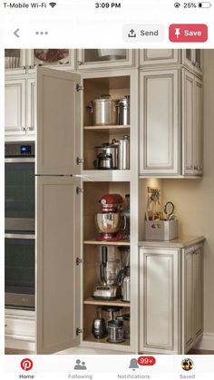 an open cabinet in the corner of a kitchen