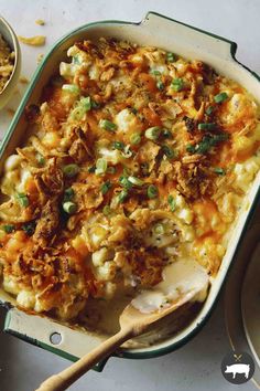 a casserole dish with meat and vegetables in it