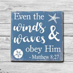 a blue and white sign that says even the winds waves and obey him on it