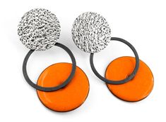 Orange drop earrings. Contemporary earrings. Geometric earrings. Circle drop earrings. Modern silver earrings. Enamel earrings. Women gift Modern orange earrings of silver and enamel. From the Pètals collection. These pieces are a one-of-a-kind handmade earrings. Measures: 45mm length and 23mm width. You can choose and customize the color of the enamel. And also the silver finish. Closure: push back. Very comfortable and lighweight. These modern earrings are ideal for to wear every day! These ge Modern Silver Earrings With Black Enamel, Sterling Silver Drop Earrings With Black Enamel, Black Enamel Sterling Silver Drop Earrings, Sterling Silver Black Enamel Drop Earrings, Single Enamel Drop Earring, Minimalist Silver Enamel Jewelry, Contemporary Drop Earrings For Gift, Black Enamel Drop Earrings, Unique Enamel Earrings For Pierced Ears