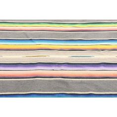 multicolored striped fabric on white background