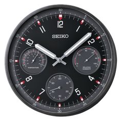 Elevate your space with the Heritage Design, Shelby Wall Clock from Seiko. This analog round wall clock features sporty colors of red white and black encompassed in a black aluminum case protected by a glass crystal face. The Lumibrite on the number indicators and hands allow you to tell the time, even in low light. This sporty clock features three precision-engineered inset dials that provide you with valuable information at a glance. A subtle yet captivating inset dial displays the seconds, re Kitchenware Shop, Hygrometer, Telling Time, Round Wall Clocks, Lamps Ceiling, Round Wall, Linen Cushion, Aa Batteries, Modern Aesthetics