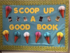 a bulletin board with paper cones and pictures on it that says scoop up a good book