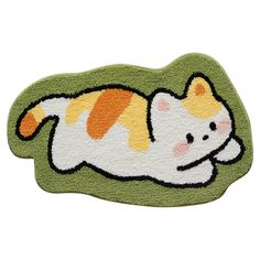 a cat rug is laying on the floor with it's head down and eyes closed