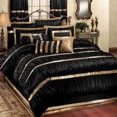 black and gold comforter set with matching pillow shampoos in a bedroom setting