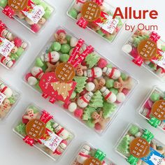 there are many different types of candies in plastic trays on the table with words allure by ouum