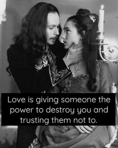 a man and woman in medieval clothing with the caption love is giving someone the power to destroy you and trusting them not to