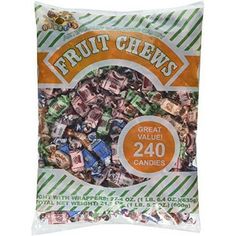 a bag of fruit chews sitting on top of a table