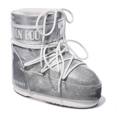 The Innovative And Iconic Shoe Brand Reboots Their Signature Low Cold Weather Boots. This Exclusive Style Features A New, Sparkling Silver Upper With The Retro-Futuristic Silhouette Moon Boot Is Known For. Features: Brand New In Original Packaging, Never Worn This Is A Limited-Edition Item Fits True To Size (5.5-7.5 Womens) Eu 36-38 Padded Upper And Collar For Optimal Comfort Functional Laces At Topline And Ankle For A Flexible Fit Round Toe Logo At Ankle And Heel 70% Ethane/30% Pvc Upper, Polye Moon Boots Outfit, Futuristic Shoes, Glitter Boots, Moon Boot, Cold Weather Boots, Weather Boots, Exclusive Shoes, Grey Boots, Cute Boots