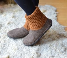 These handmade felted house shoes are made using all natural products -wool, hot water and soap. It will perfectly fit for wearing inside/outside. They are soft and so easy that even imperceptible, it will fit like your second skin. House shoes will let your feet skin breathe, because these felted shoes are made using only natural products. Natural wool have properties to keep your foots warm and don't sweat at the same time. Soles are glued and sewed for long lasting purpose. This felted house Felted House, Ankle Warmers, Felted Shoes, Felt House, Inside Outside, House Shoes, Natural Products, Second Skin, Natural Wool