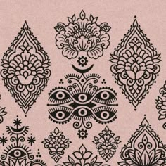 black and white ornamental designs on pink paper