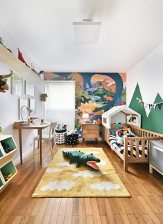 a child's room decorated in green, white and yellow with toys on the floor