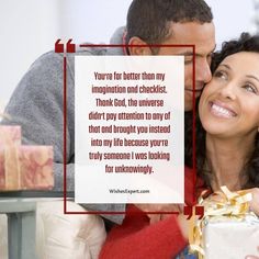 a man giving a woman a hug on the cheek while holding a wrapped present in front of him