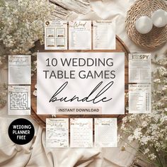 the 10 wedding table games bundle is shown on top of a white sheet with flowers