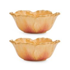 two orange bowls sitting on top of each other