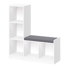 a white bookcase with two shelves and a black cushion on the bottom one shelf