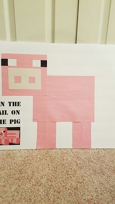 a piece of paper cut out to look like a pink cow with the words on it