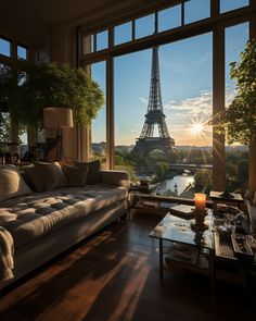 a living room with a view of the eiffel tower