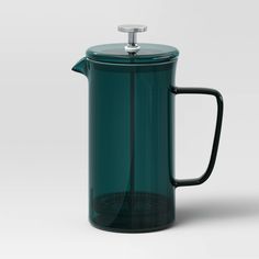 a teal colored french press coffee maker with a glass lid and stainless steel handle