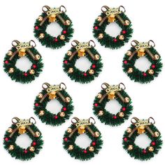 six christmas wreaths with bells and bells on them