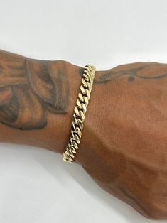 This is a 14K Yellow Gold Miami Cuban bracelet with 6.5-6.7mm links. It's made in a 14K gold semi-hollow style, which means you can still have the big bold look the Miami Cubans are well-known for but without the huge price tag. It's perfect for everyday wear. Great size for both men and women. Please be mindful of the bracelet length for those with smaller wrists. Be sure to measure wrist or ankle before purchasing.   ~ Approximately 6.5-6.7mm wide  ~ Real 14K yellow gold  ~ Semi-hollow/semi-so Cuban Link Bracelet Men Gold, Mens Gold Bracelet, Gold Bracelets For Men, Cuban Bracelet, Father Time, Miami Cuban Link Chain, Wrist Jewelry, Mens Gold Bracelets, Miami Cuban