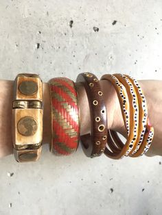 Four great bangles to purchase separately or as a curated bangle stack collection and save $15! Choose at checkout: 1 - Bone and Brass 2 - Brass and Weave 3 - Wood and Brass Holes 4 - Wooden Snake Measurements: Red stripes bangle and bone bangle: 2 6/10 inches on the interior Wooden grommets: 3 inches on the interior Snake: 3 and 1/10 inch Excellent condition, great gift, free shipping. On orders outside the US, the shipping rate listed is a flat rate, however any overage in actual shipping charges will be refunded to you after the order is processed. Most clothing and smaller items will ship in a compostable plant-based poly mailer with unbleached tissue paper, jute twine and a plantable note that might grow some wildflowers. Stack Bangles, Wood Bangles, Wooden Snake, Wooden Bangles, Wooden Bangle Bracelet, Bangle Stack, Boho Bangle, Wooden Bangle