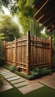 a bamboo fence in the middle of a garden