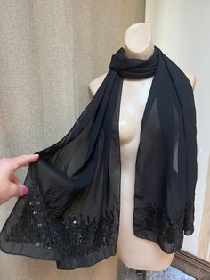 "Long elegant evening scarf for any evening event.  Measures 78\" long and 20\" wide so significantly more length and width than most scarf wraps.  Made in India. Fabric is polyester crepe with a bit of sheerness. Wide sections of square black sequins at sides. no pull or runs or missing beads." Scarf Wraps, Evening Scarf, Evening Wrap, India Fabric, Evening Wraps, Wrap Scarf, Beaded Wraps, Black Sequins, Long Black