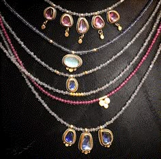 Five luminous pink sapphire pendants shimmer on a delicate strand of labradorite beads, accented with two 20k gold beads. Sapphires are set in 22k gold bezels with sterling silver backs. Pendants hang from a 15.5 inch chain. Center pendant measures approximately 1/3 inch tall. Matte finish. Vintage Indian Jewelry, Painting Jewelry, Pink Sapphire Pendant, Make A Necklace, Diy Necklaces, Accesories Jewelry, Dope Jewelry, Labradorite Beads, Ancient Jewelry