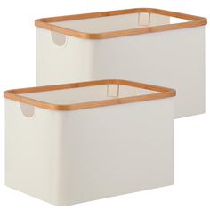 two white storage containers with wooden handles