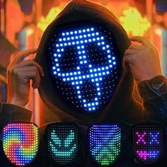 a person wearing a hoodie with four different colored lights in front of him and behind them