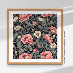 an art print with pink and white flowers on a black background in a wooden frame