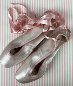 This is a lovely vintage pair of Capezio Ballet Point Shoes. They were hand made in the 1990's and were maybe used once. They are very clean and the suede toes have only a slight scuff. These are "Duro Toe" and have a true pink color, they have silk ribbon ties. The shoes are a size 2 1/2 D, this is not a street shoe size, they measure approx. 8 1/4" long. These are perfectly wearable, but also make the most adorable wall or bedpost  decor for a girls room. Ballet Pointe Shoes, H.e.r Aesthetic, Satin Ribbons, Street Shoes, Point Shoes, Pointe Shoes, Shoes Pink, Formal Attire, Toe Shoes