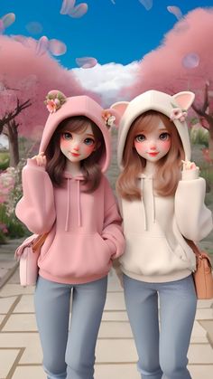 two dolls are standing next to each other in front of trees with pink flowers on them