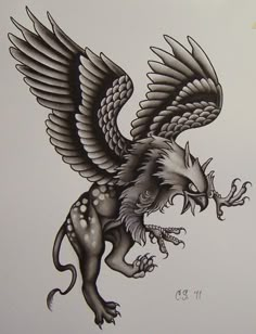 an eagle tattoo design on the back of a white paper sheet, with black ink