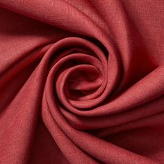 a red fabric with very thin folds