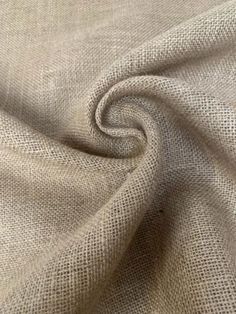 a close up shot of a beige fabric