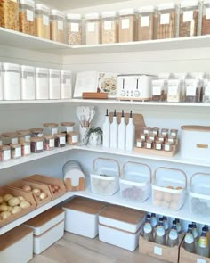 the shelves are filled with different types of food and storage containers, including breads