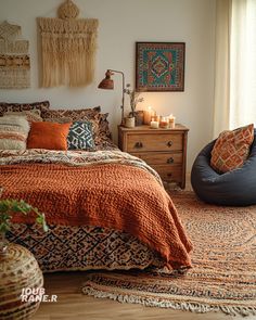 a bed room with a neatly made bed and a bean bag chair next to it