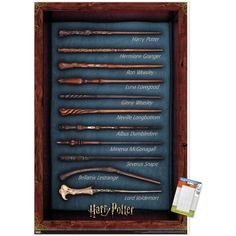 harry potter's wands are displayed in a wooden box