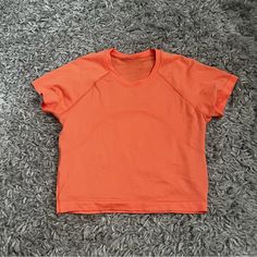 Lululemon Swiftly Tech Cropped Short Sleeve Coral Kiss Size 8 Never Worn Just Tried On Cute Preppy Tops, Cute Lululemon Outfits Summer, Lulu Tops, Cute Lululemon Outfits, Sage Christmas, Nike Winter Jackets, Orange Preppy, Orange Lululemon