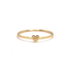 Engrave your initial with a loved ones initial onto this modern tiny heart ring. It's perfect as a couples and friendship gift. Please write the 2 initials you would like to engrave on the Notes box in the Shopping Cart. Gold Vermeil Laser Engraving Hypoallergenic, lead and nickel free Heart Height 3.5mm Band 1mm #R108 Heart Couple, Gold Initial Ring, Gold Bond, Initial Ring, Tiny Heart, Friendship Gifts, Gold Vermeil, Shopping Cart, Laser Engraving