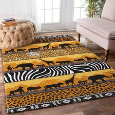 a rug with animals and zebras on it