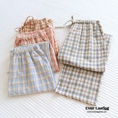 Lounge in comfort with Ever Lasting's Plaid Washed Cotton Pajama Pants. Made from super soft and breathable washed cotton, these pants bring ultimate comfort and style to your relaxation routine. The classic plaid pattern adds a timeless touch, making them perfect for lounging at home or enjoying a cozy night in. With an elastic waistband and relaxed fit, these pajama pants are designed for maximum comfort after a long day. Treat yourself to the perfect blend of comfort and style with our Plaid Washed Cotton Pajama Pants. Features: Relax Fit Premium Quality Stretchy Waistband Breathable (great for all seasons) 100% Cotton Great Gift! Sizes: Small/Medium: Pant Length 38 in (96cm), Waist 42 in (106cm), Hip 25 in (63cm) Medium/Large: Pant Length 39 in (99cm), Waist 44 in (112cm), Hip 26 in (6 Pyjamas Pants, Stylish Pajamas, Christmas Pajama Pants, Cotton Pajama Pants, Pajama Pattern, Cozy Pants, Plaid Pajama Pants, Cute Pajama Sets, Comfortable Pajamas