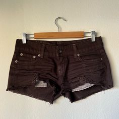 Carmar Denim Short Shorts Purchased From Lf Store. Dark Brown Color. Size 27. Peekaboo Pockets. Wrinkles And Tears Are Part Of The Design. Never Worn. Approx Lay Flat Measurements: Front: 8” Side: 9” Back: 11” Waist: 16” Steampunk Shorts, Denim Short Shorts, Brown Shorts, Dark Brown Color, Denim Short, Short Shorts, Vintage Brown, Black Shorts, Brown Color