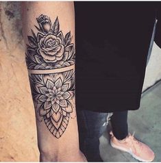 a person with a black and white tattoo on their arm, next to an instagram