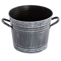 an empty metal bucket with handles on a white background