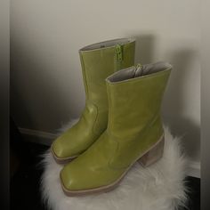 Free People Ruby Platform Booties Size 40/10 New Without Box Seals Still On The Bottom Sole On Boots Inserts Still In The Boots Sold Out Color And Size Color: Lime Green Step Out In Style With This Powerful Platform Bootie Featuring A Towering Stacked Heel. A Bonus Side Zip Closure Makes It Easy To Slip Off When The Day Is Through. 3 1/2" Heel; 1" Platform (Size 40) 6 1/2" Shaft Leather Upper And Lining/Synthetic Sole Made In Spain Item #6854315 Ingredients Upper Content: 100% Leather Midsole Content: 100% Rubber Outsole Content: 100% Leather Stack Sock Liner: 100% Leather Green Gogo Boots, Green Boots, Gogo Boots, Free People Shoes, Liner Socks, Boot Brands, Leather Boot, Stacked Heel, Shoes Heels Boots